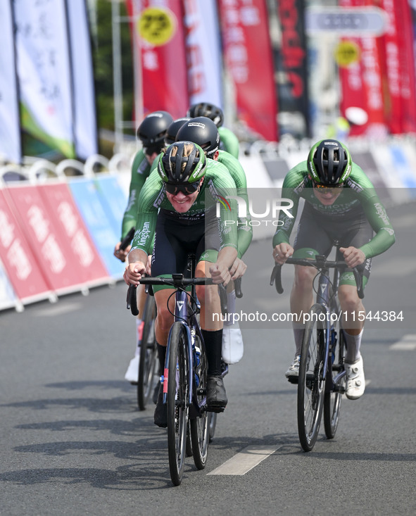 Participants ride during the 12th Round of the Poyang Lake International Cycling Competition in Leping, China, on September 3, 2024. 