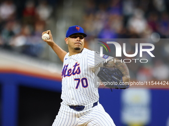 New York Mets relief pitcher Jose Butto #70 throws during the seventh inning of the baseball game against the Boston Red Sox at Citi Field i...