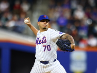 New York Mets relief pitcher Jose Butto #70 throws during the seventh inning of the baseball game against the Boston Red Sox at Citi Field i...