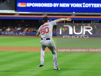 Boston Red Sox pitcher Kutter Crawford #50 fields the ball and throws to first base during the fourth inning of the baseball game against th...