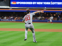 Boston Red Sox pitcher Kutter Crawford #50 fields the ball and throws to first base during the fourth inning of the baseball game against th...