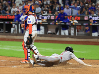 Boston Red Sox Jarren Duran #16 scores on a sacrifice fly during the sixth inning of the baseball game against the New York Mets at Citi Fie...