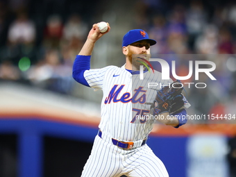 New York Mets relief pitcher Reed Garrett #75 throws during the eighth inning of the baseball game against the Boston Red Sox at Citi Field...