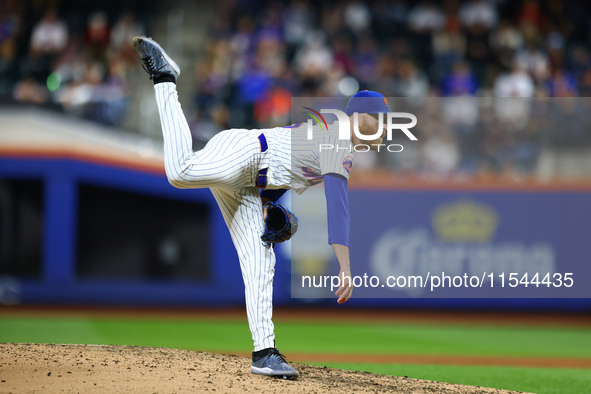 New York Mets relief pitcher Reed Garrett #75 throws during the eighth inning of the baseball game against the Boston Red Sox at Citi Field...