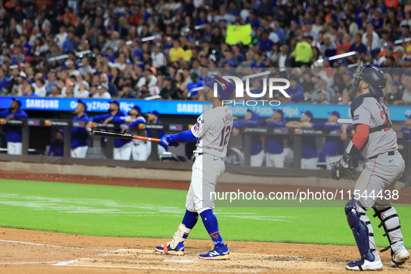 Francisco Lindor #12 of the New York Mets hits a home run during the third inning of the baseball game against the Boston Red Sox at Citi Fi...