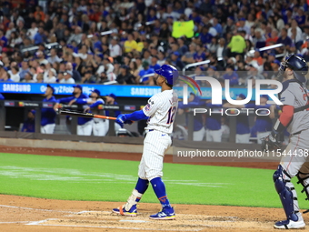 Francisco Lindor #12 of the New York Mets hits a home run during the third inning of the baseball game against the Boston Red Sox at Citi Fi...