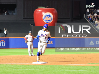 Francisco Lindor #12 of the New York Mets hits a home run during the third inning of the baseball game against the Boston Red Sox at Citi Fi...