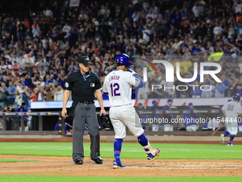 Francisco Lindor #12 of the New York Mets hits a home run during the third inning of the baseball game against the Boston Red Sox at Citi Fi...