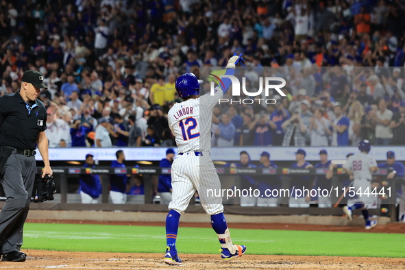 Francisco Lindor #12 of the New York Mets hits a home run during the third inning of the baseball game against the Boston Red Sox at Citi Fi...