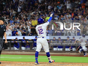 Francisco Lindor #12 of the New York Mets hits a home run during the third inning of the baseball game against the Boston Red Sox at Citi Fi...