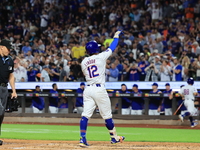 Francisco Lindor #12 of the New York Mets hits a home run during the third inning of the baseball game against the Boston Red Sox at Citi Fi...