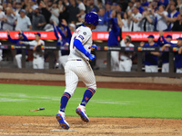 Jeff McNeil #1 of the New York Mets scores from second base during the eighth inning of the baseball game against the Boston Red Sox at Citi...