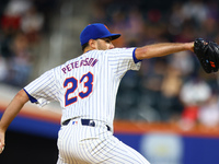 New York Mets starting pitcher David Peterson #23 throws during the second inning of the baseball game against the Boston Red Sox at Citi Fi...