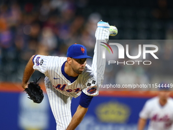 New York Mets starting pitcher David Peterson #23 throws during the second inning of the baseball game against the Boston Red Sox at Citi Fi...