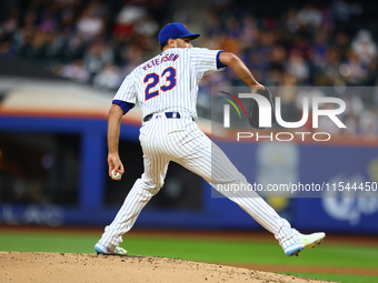 New York Mets starting pitcher David Peterson #23 throws during the second inning of the baseball game against the Boston Red Sox at Citi Fi...