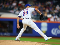 New York Mets starting pitcher David Peterson #23 throws during the second inning of the baseball game against the Boston Red Sox at Citi Fi...