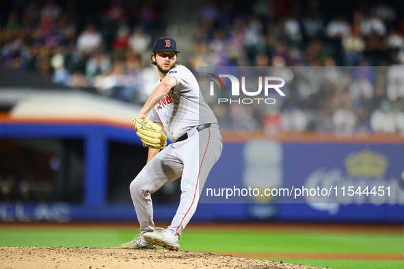 Boston Red Sox pitcher Justin Slaten #63 throws during the seventh inning of the baseball game against the New York Mets at Citi Field in Co...