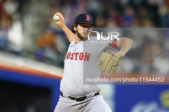 Boston Red Sox pitcher Justin Slaten #63 throws during the seventh inning of the baseball game against the New York Mets at Citi Field in Co...