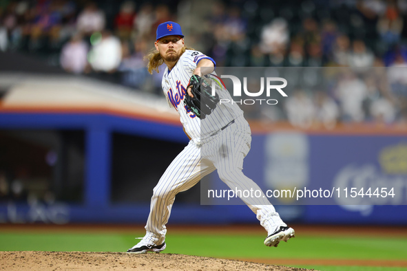 New York Mets relief pitcher Ryne Stanek #55 throws during the ninth inning of the baseball game against the Boston Red Sox at Citi Field in...