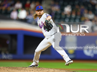 New York Mets relief pitcher Ryne Stanek #55 throws during the ninth inning of the baseball game against the Boston Red Sox at Citi Field in...