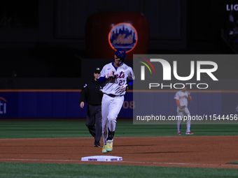 Mark Vientos #27 of the New York Mets rounds the bases after homering during the seventh inning of the baseball game against the Boston Red...