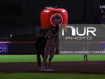 Mark Vientos #27 of the New York Mets rounds the bases after homering during the seventh inning of the baseball game against the Boston Red...