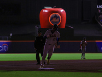 Mark Vientos #27 of the New York Mets rounds the bases after homering during the seventh inning of the baseball game against the Boston Red...