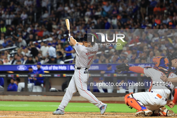 Masataka Yoshida #7 of the Boston Red Sox singles during the fifth inning of the baseball game against the New York Mets at Citi Field in Co...