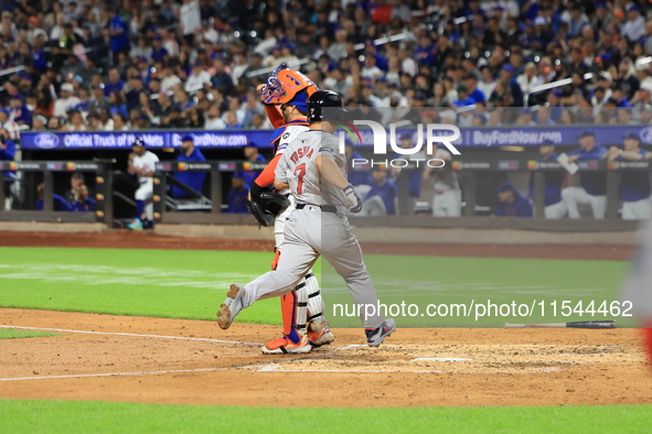 Boston Red Sox Masataka Yoshida #7 scores during the fifth inning of the baseball game against the New York Mets at Citi Field in Corona, N....