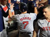 Boston Red Sox Masataka Yoshida #7 scores during the fifth inning of the baseball game against the New York Mets at Citi Field in Corona, N....