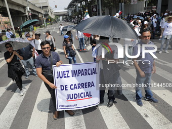 Law students from different universities join a demonstration outside the Sala de Armas in the Ciudad Deportiva to protest against the judic...