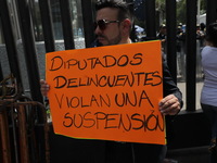 Law students from different universities join a demonstration outside the Sala de Armas in the Ciudad Deportiva in Mexico City, Mexico, to p...