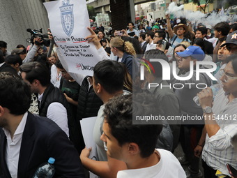 Law students from different universities join a demonstration outside the Sala de Armas in the Ciudad Deportiva to protest against the judic...