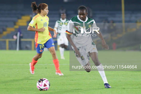 Lamine Mana of Cameroon controls the ball during the FIFA U-20 Women's World Cup 2024 match between Colombia and Cameroon at the El Campin s...