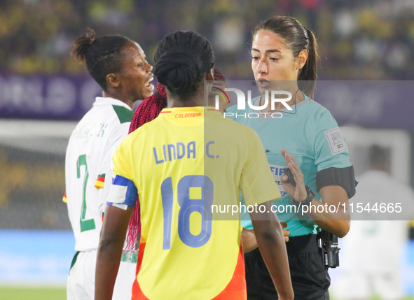 The referee talks with Linda Caicedo of Colombia during the FIFA U-20 Women's World Cup 2024 match between Colombia and Cameroon at the El C...