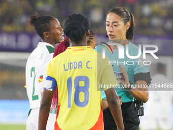 The referee talks with Linda Caicedo of Colombia during the FIFA U-20 Women's World Cup 2024 match between Colombia and Cameroon at the El C...