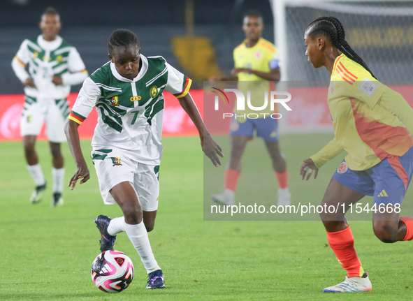 Lamine Mana of Cameroon and Sintia Cabezas of Colombia fight for the ball during the FIFA U-20 Women's World Cup 2024 match between Colombia...