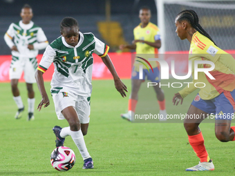 Lamine Mana of Cameroon and Sintia Cabezas of Colombia fight for the ball during the FIFA U-20 Women's World Cup 2024 match between Colombia...