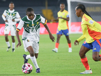 Lamine Mana of Cameroon and Sintia Cabezas of Colombia fight for the ball during the FIFA U-20 Women's World Cup 2024 match between Colombia...