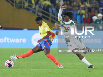 Yunaira Lopez of Colombia and Naomi Eto fight for the ball during the FIFA U-20 Women's World Cup 2024 match between Colombia and Cameroon a...