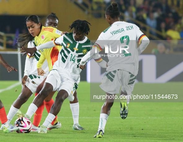 Monique Ngock of Cameroon and Maithe Lopez of Colombia fight for the ball during the FIFA U-20 Women's World Cup 2024 match between Colombia...