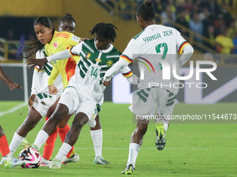 Monique Ngock of Cameroon and Maithe Lopez of Colombia fight for the ball during the FIFA U-20 Women's World Cup 2024 match between Colombia...