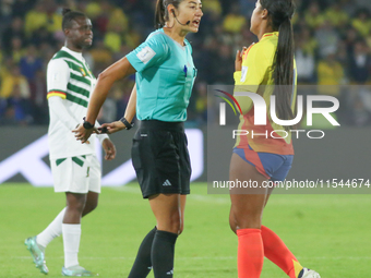 The referee talks with Maithe Lopez of Colombia during the FIFA U-20 Women's World Cup 2024 match between Colombia and Cameroon at the El Ca...