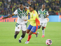 Mary Jose Alvarez of Colombia and Nina Ngueleu of Cameroon fight for the ball during the FIFA U-20 Women's World Cup 2024 match between Colo...