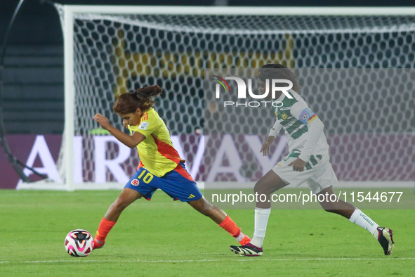 Gabriela Rodriguez of Colombia and Naomi Eto of Cameroon fight for the ball during the FIFA U-20 Women's World Cup 2024 match between Colomb...