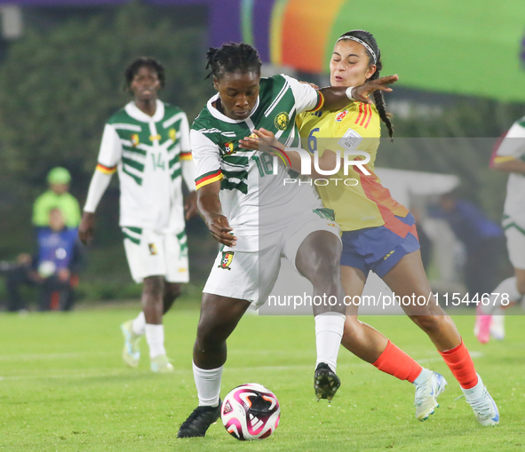 Mary Jose Alvarez of Colombia and Liz Osorio of Cameroon fight for the ball during the FIFA U-20 Women's World Cup 2024 match between Colomb...