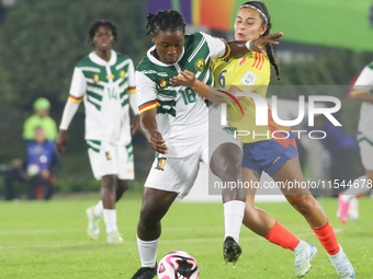 Mary Jose Alvarez of Colombia and Liz Osorio of Cameroon fight for the ball during the FIFA U-20 Women's World Cup 2024 match between Colomb...