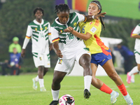 Mary Jose Alvarez of Colombia and Liz Osorio of Cameroon fight for the ball during the FIFA U-20 Women's World Cup 2024 match between Colomb...