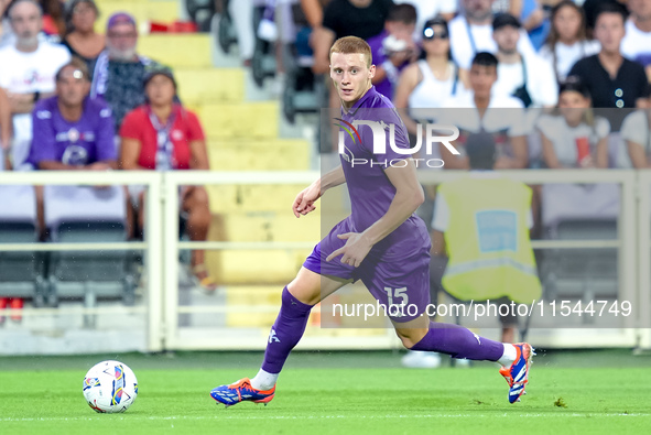 Pietro Comuzzo of ACF Fiorentina in action during the Serie A Enilive match between ACF Fiorentina and AC Monza at Stadio Artemio Franchi on...