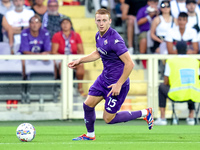 Pietro Comuzzo of ACF Fiorentina in action during the Serie A Enilive match between ACF Fiorentina and AC Monza at Stadio Artemio Franchi on...